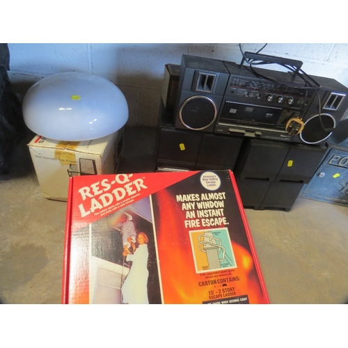 619 - A selection of items to include a boxed fire escape ladder, stereo, CD's etc.