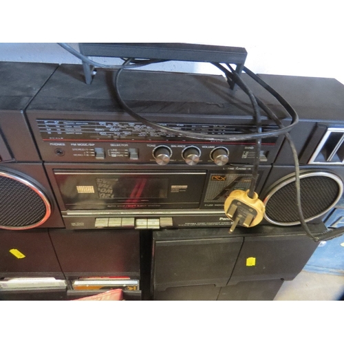 619 - A selection of items to include a boxed fire escape ladder, stereo, CD's etc.