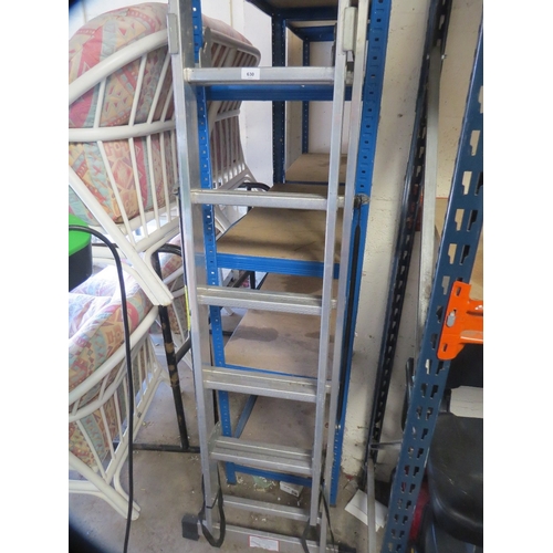 630 - An aluminium extending short combination ladder