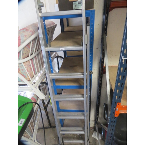 630 - An aluminium extending short combination ladder