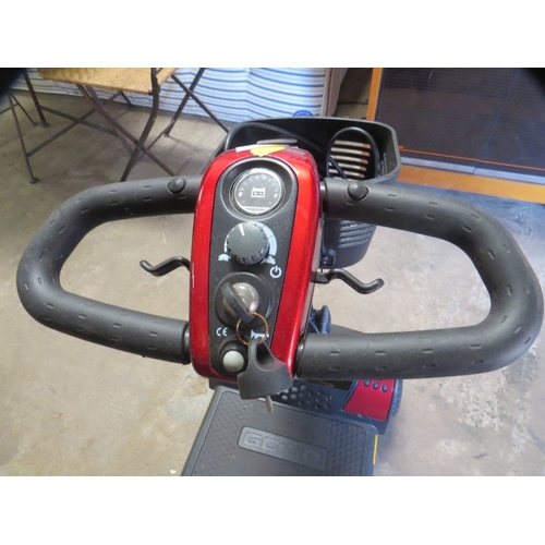 632 - A Pride Go Go lightweight mobility scooter with key and charger