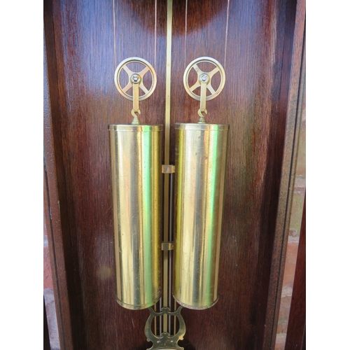 711 - A tall slender 8 day gong strike Vienna wall clock by Fenclocks of Suffolk, with Hermle movement and... 