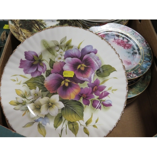 135 - A tray of assorted collectors plates
