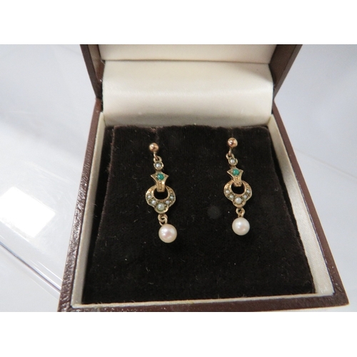 338 - A pair of hallmarked 9 carat gold vintage earrings set with seed pearls