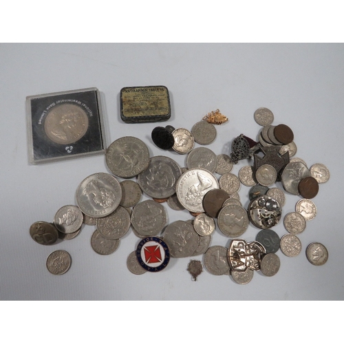 421 - A selection of coins and collectables to include silver badges etc.