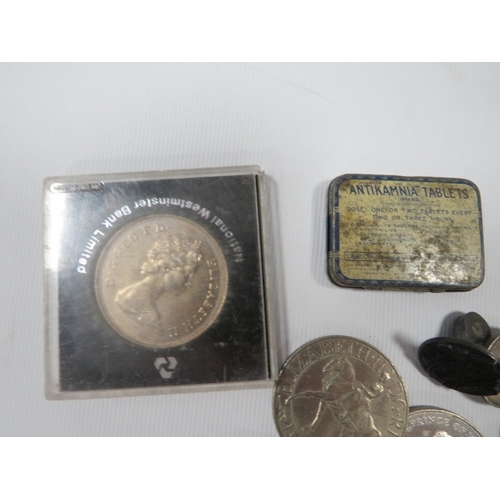 421 - A selection of coins and collectables to include silver badges etc.