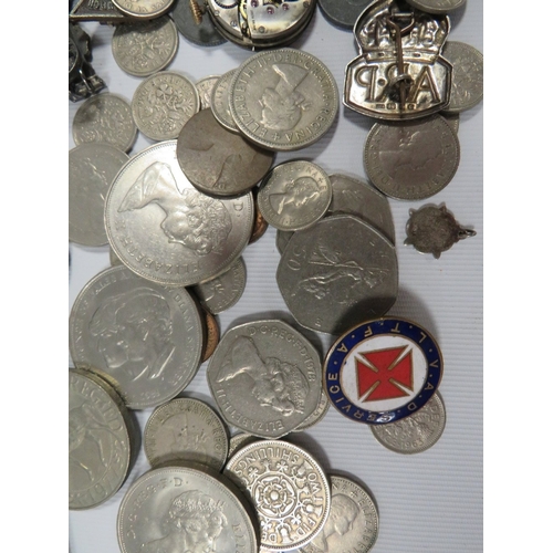 421 - A selection of coins and collectables to include silver badges etc.