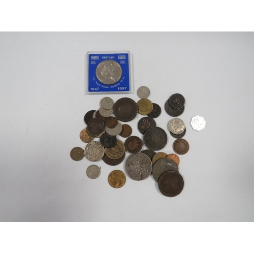 422 - A quantity of collectable coins to include Charles II silver crown