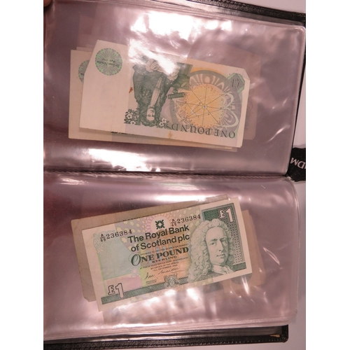 424 - An album of British ten shilling and one pound notes