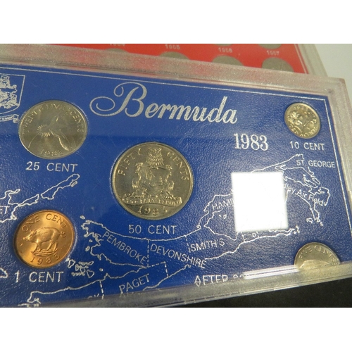 431 - A tin of assorted coin sets etc