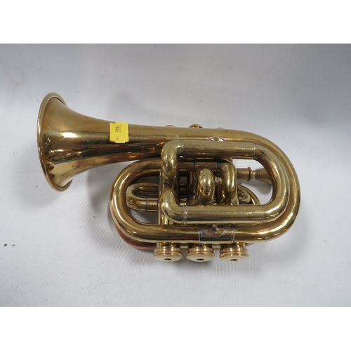 445 - A brass pocket cornet