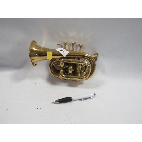 445 - A brass pocket cornet
