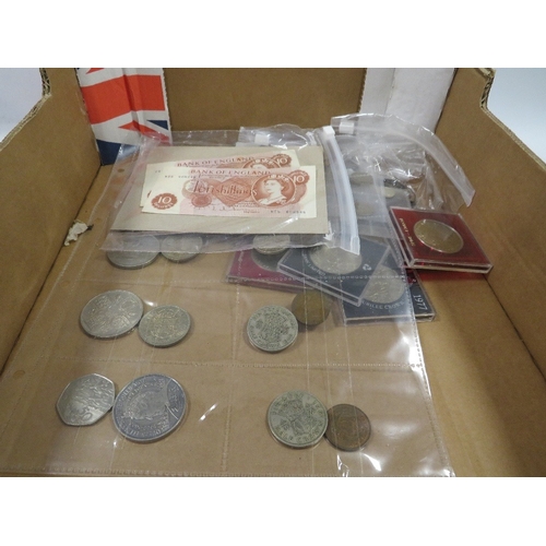 448 - A small quantity of coins and notes to include 10 shilling notes