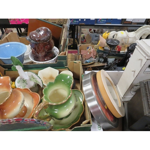 451 - Four trays of ceramics and collectables to include a tray of clocks