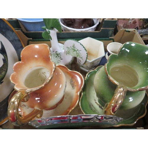 451 - Four trays of ceramics and collectables to include a tray of clocks