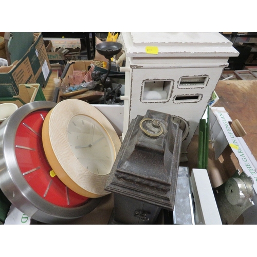 451 - Four trays of ceramics and collectables to include a tray of clocks