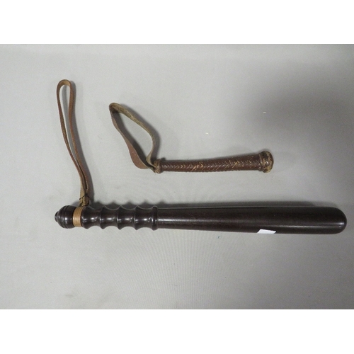 A vintage lignum vitae truncheon together with a leather fishing priest