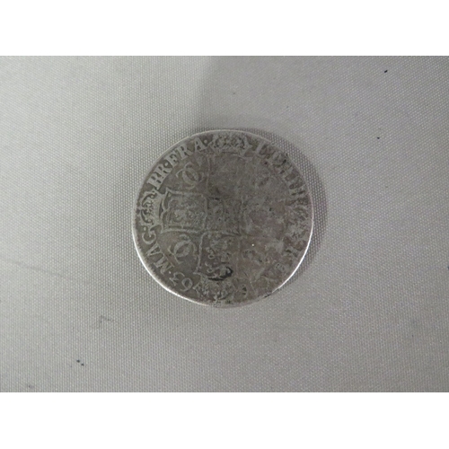 A Charles II silver crown dated 1663