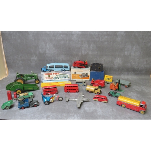 A COLLECTION OF VINTAGE BOXED / UNBOXED DIE CAST VEHICLES, to include boxed Dinky Pullmore car transporter 982, boxed Dinky Blaw Knox bulldozer 561, boxed Meccano 20v electric motor, boxed Dinky Hawker Hunter fighter 736, unboxed Dinky Comer tow truck, unboxed Dinky forklift truck, unboxed Dinky Landrover, unboxed Dinky Bedford dust cart, unboxed Dinky AEC Monarch Thompson tank, two unboxed Dinky double decker buses, unboxed Dinky NCB electric van et.