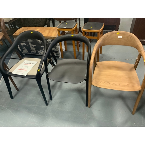 Three assorted modern dining chairs