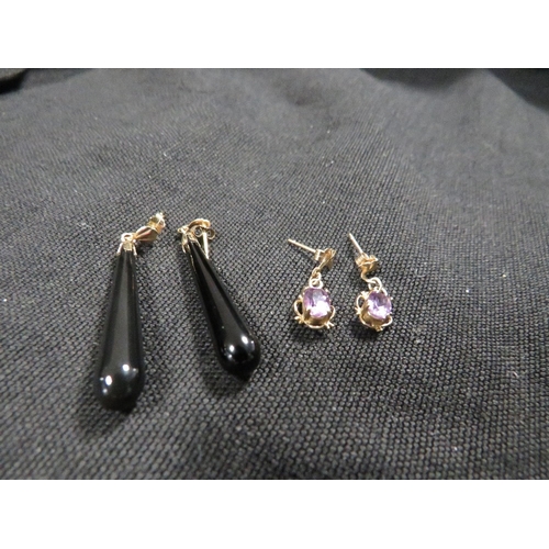 A pair of vintage amethyst earrings together with a pair of dropper earrings