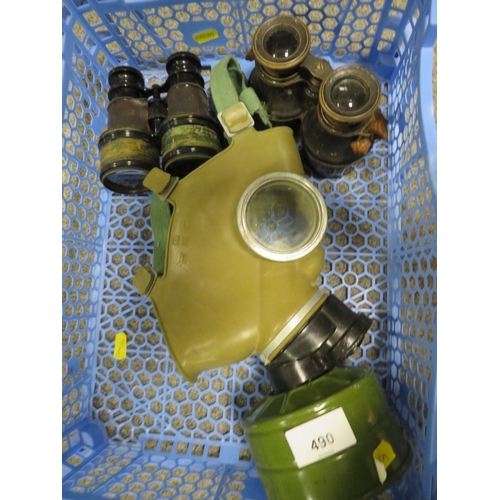 A vintage Russian gas mask and 2 pairs of antique military style field glasses