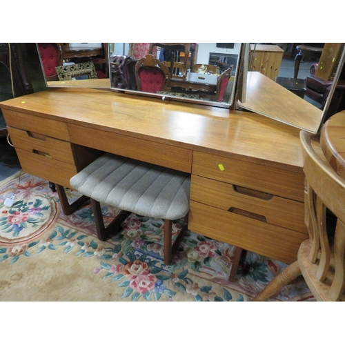 A mid-century Uniflex dressing table and stool