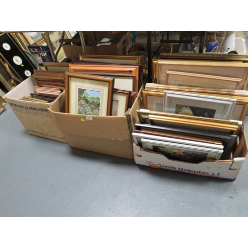 33 - A large collection of assorted pictures and prints in three boxes