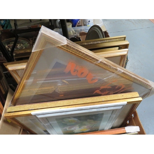 33 - A large collection of assorted pictures and prints in three boxes