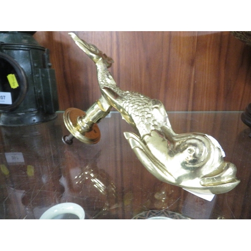 A cast metal sea serpent
