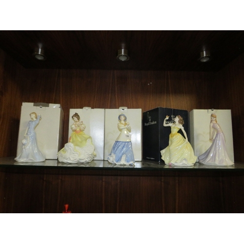 Five assorted Royal Doulton figurines with boxes - some signed by Michael Doulton