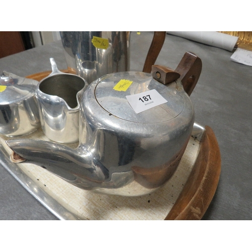 A vintage picquot tea set on tray