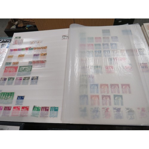 128 - Twenty stamp stock books / albums containing Commonwealth, European, American, South American and wo... 