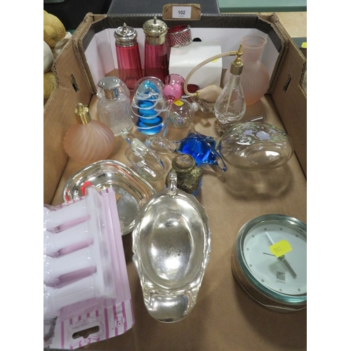 102 - Two trays of glassware to include paperweights and scent bottles