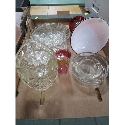 102 - Two trays of glassware to include paperweights and scent bottles