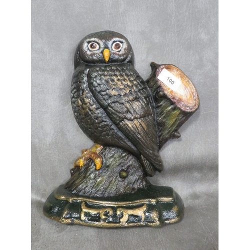 100 - **A cast metal doorstop in the form of an owl**