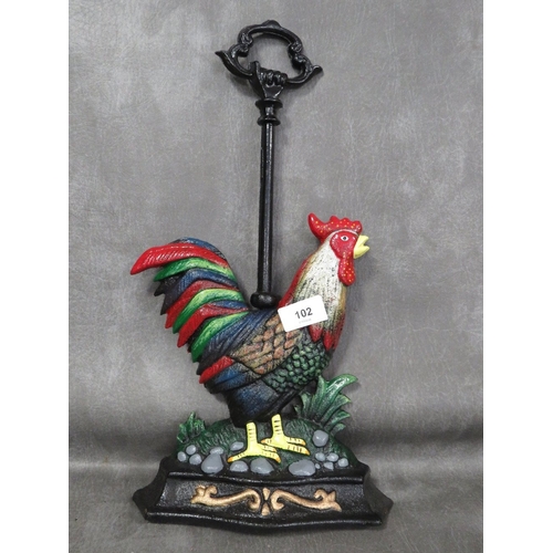 102 - **A cast metal cockerel doorstop with handle to top**
