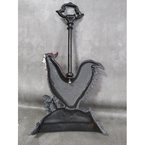 102 - **A cast metal cockerel doorstop with handle to top**