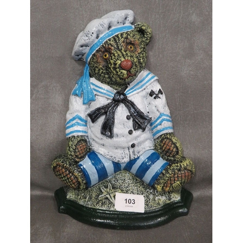 103 - **A cast metal doorstop in the form a a sailor bear**