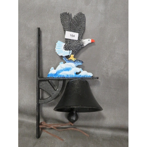 104 - **A cast metal bald eagle wall mounted bell**