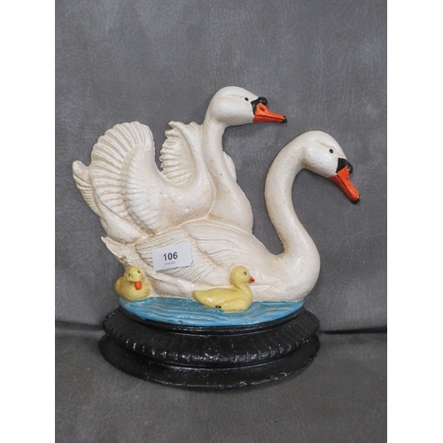 106 - **A cast metal swans themed doorstop**