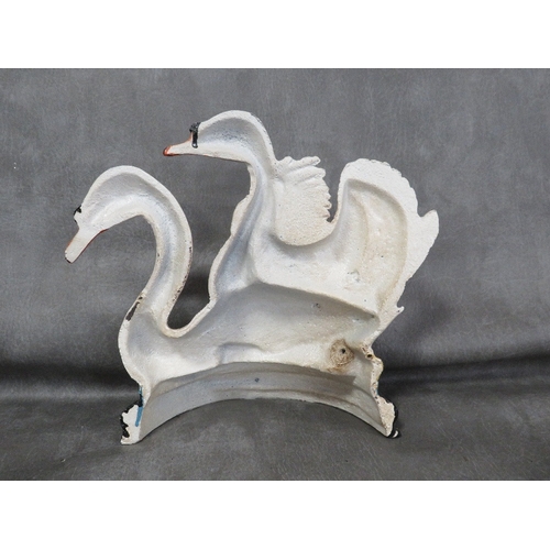 106 - **A cast metal swans themed doorstop**
