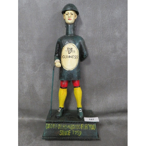 107 - **A reproduction vintage style cast metal Guinness figure**