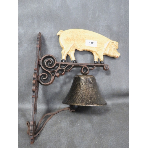 112 - **A cast metal wall hanging pig bell**