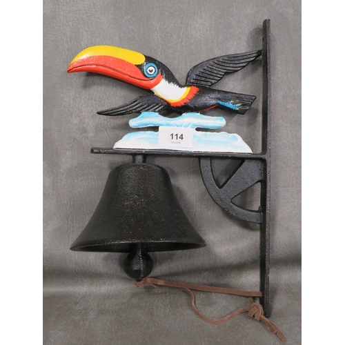 114 - **A cast metal toucan wall hanging bell**