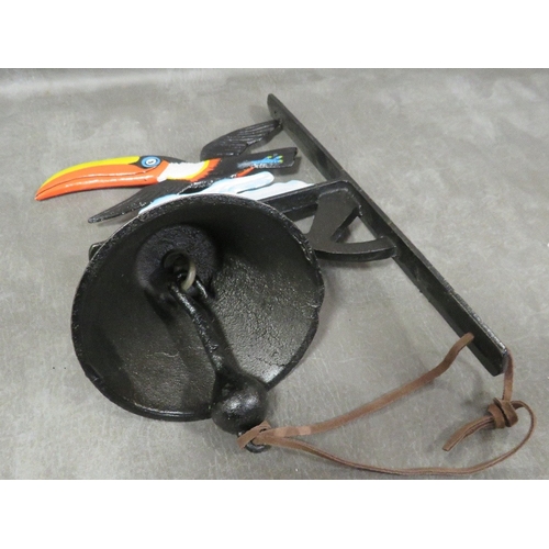 114 - **A cast metal toucan wall hanging bell**