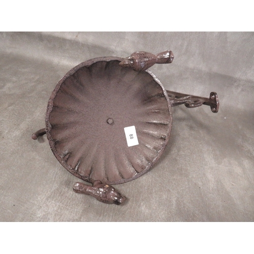 88 - **A wall mounted bird bath**