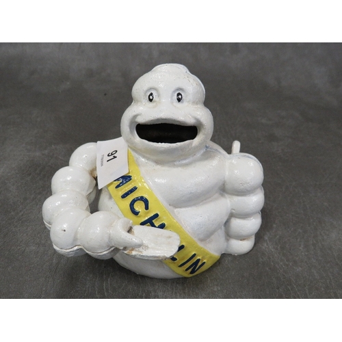 91 - **A small Michelin mechanical money bank**