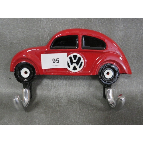 95 - **A cast VW Beetle key themed hook**