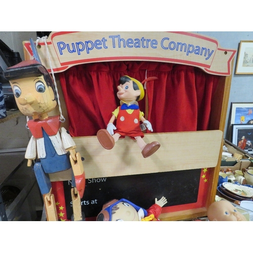 122 - Two trays of assorted vintage toys to include Corgi, Dinky, Del Prado, puppets and a puppet theatre ... 